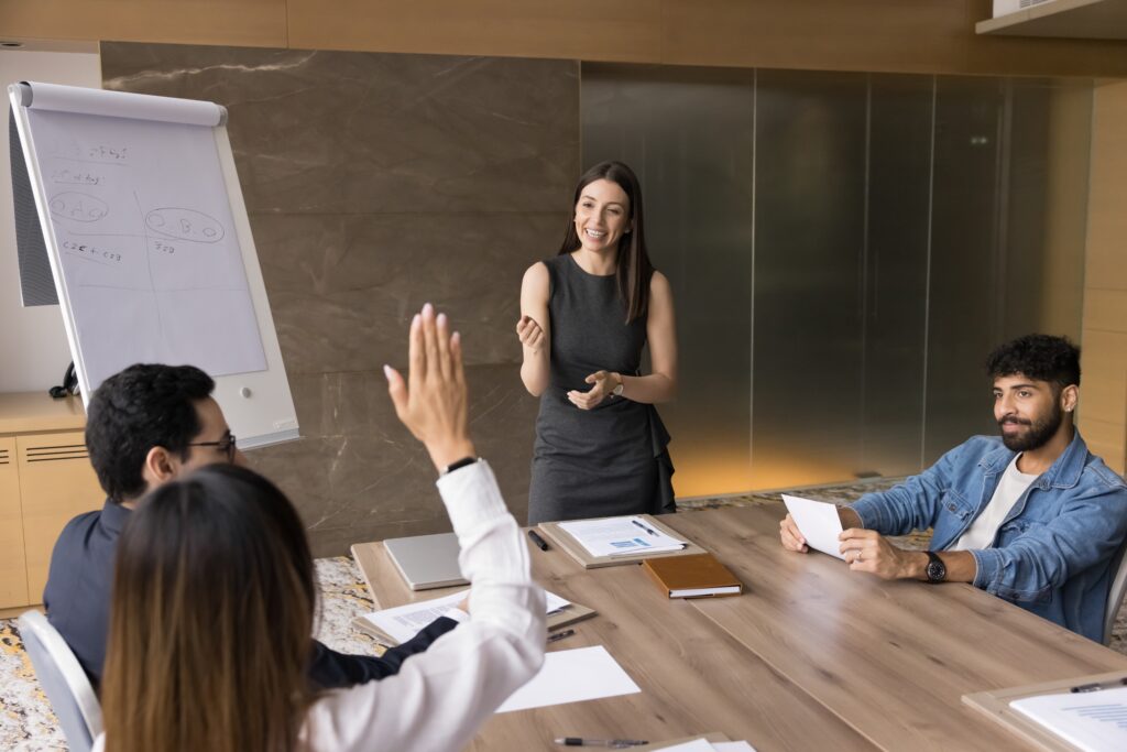 Woman communicating with a group of people